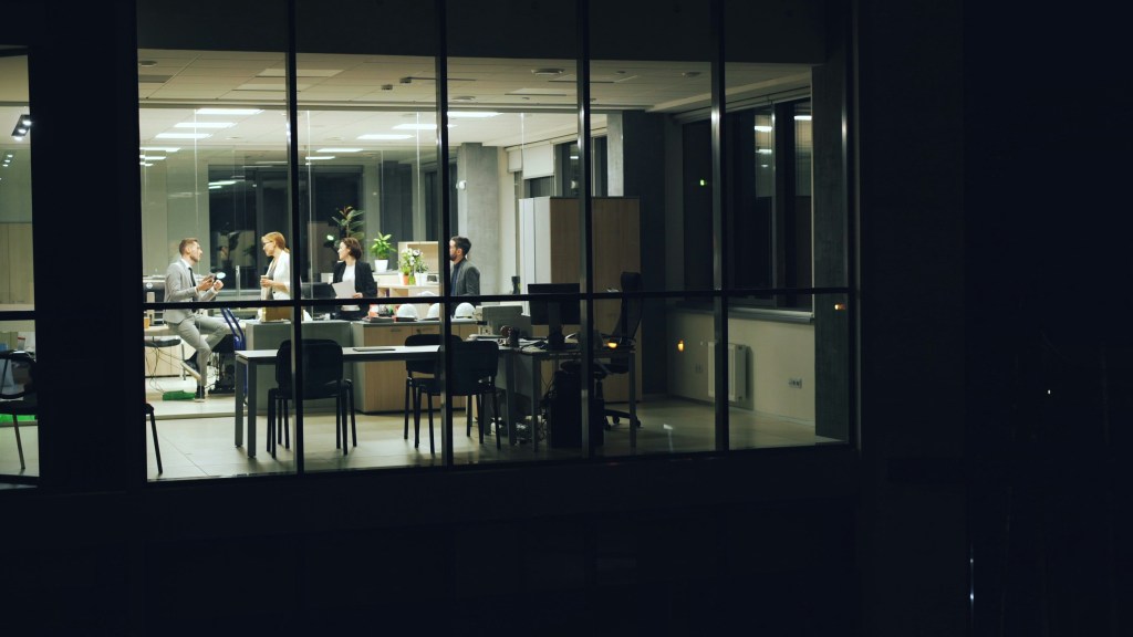 Office workers at night time