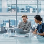 Multiethnic Diverse Office Conference Room Meeting: Team of Two